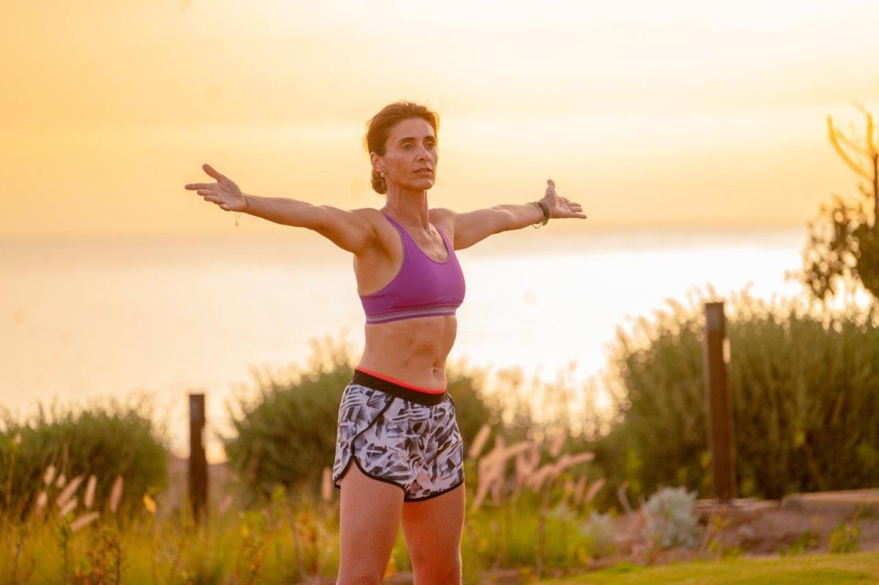 Hyatt Regency Taghazout Hotel Exterior photo A woman wearing a sports bra